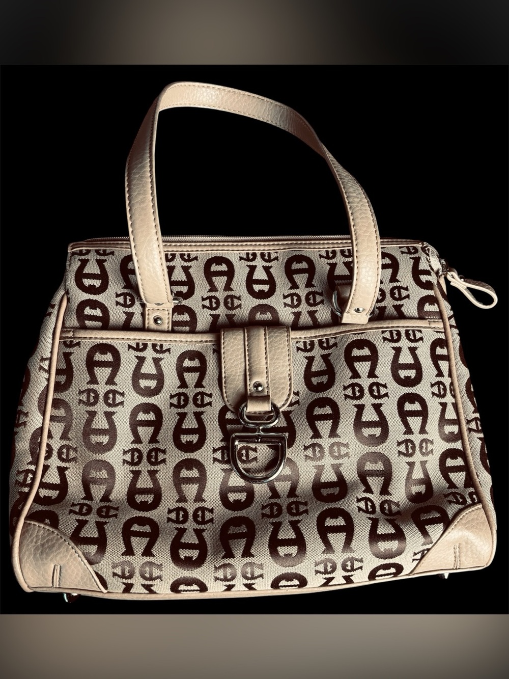 A vintage Etienne Aigner monogram logo print handbag in tan and brown. NWOT